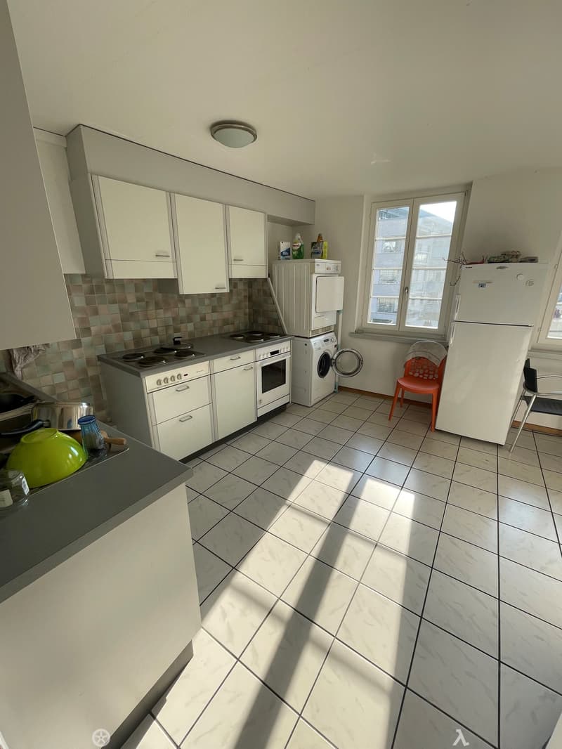 white cabinets, tiled floor, white refrigerator, washing machine, oven, stove, countertop, ceiling lamp, window