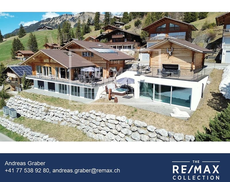 Exklusives Wohnen mit einzigartigem Panorama - eine magische Perle in stilvoller Architektur (1)