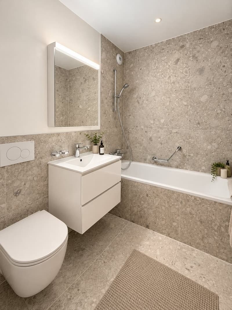 Salle_de_bain_moderne_aux_tons_pierre.png