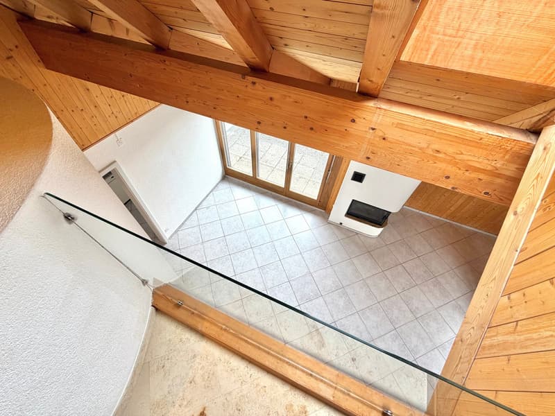 wooden ceiling, tiled floor, glass railing, fireplace