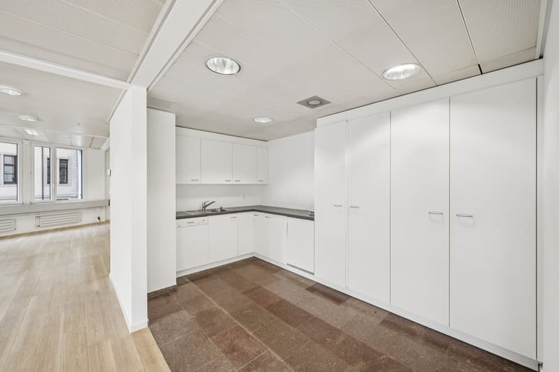 modern kitchen with white cabinets, floor tiles, sink, faucet, dishwasher