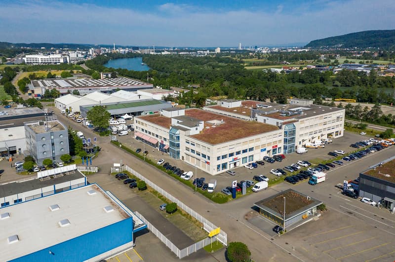 Multi-building industrial estate with parking lot and road network