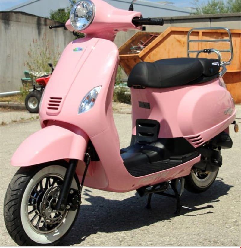 Pink scooter with a black seat, white wheels, and black metal stand