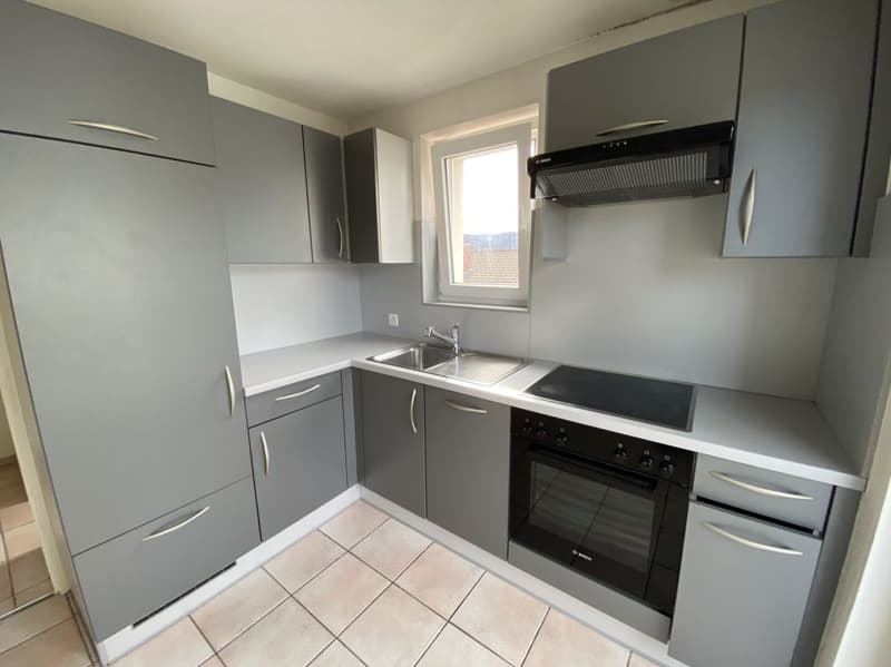 Tavannes, immeuble de rendement 8 appartements, 2 garages et 7 places de parc (9)