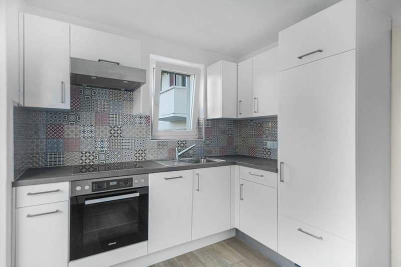 Tavannes, immeuble de rendement 8 appartements, 2 garages et 7 places de parc (4)