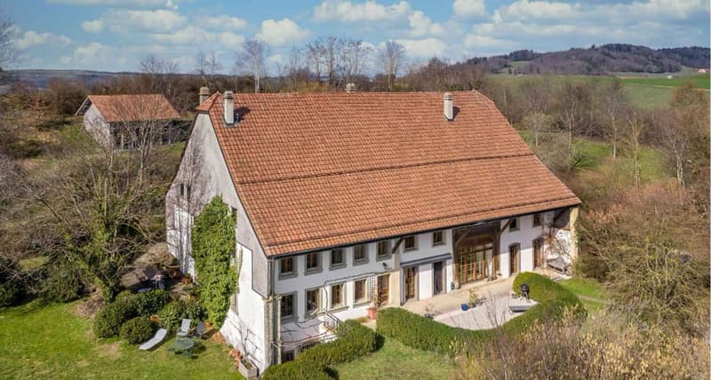 Appartement à vendre avec 2126m2 terrain privé : Une oasis au coeur de la campagne fribourgeoise (1)
