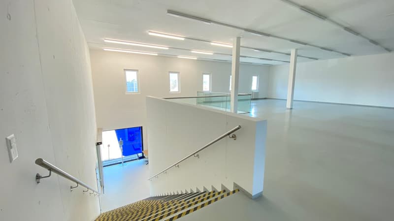 white walls, white floor, glass railing, metal handrail, staircase