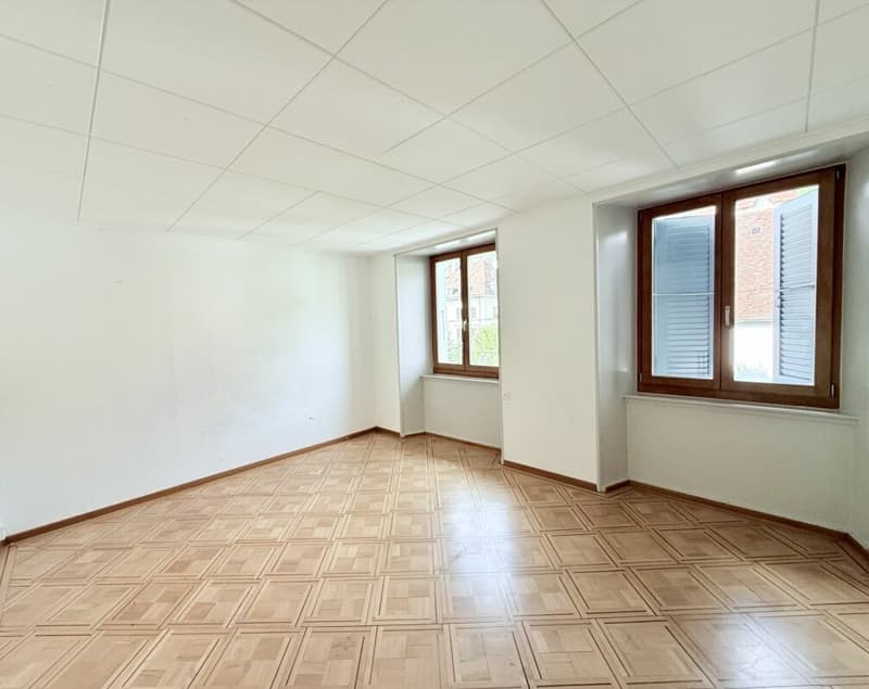 SPACIEUX 4.0 PIÈCES DE 92 M² AU COEUR DU LOCLE ! (3)