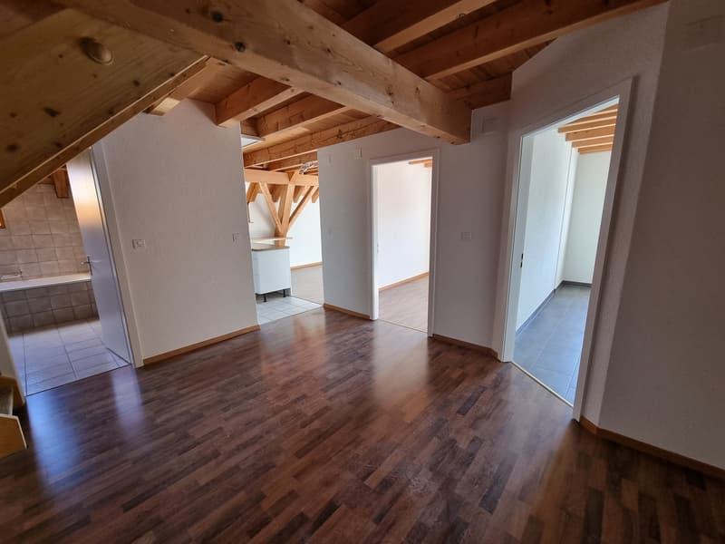 empty room, wooden floor, wooden ceiling, white walls, open doors