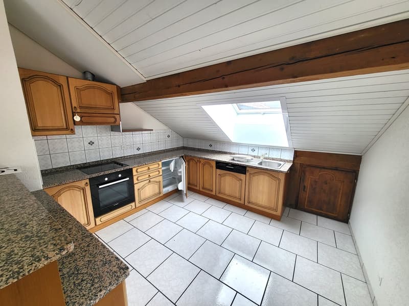 Appartement 3 pièces mansardé avec balcon (1)
