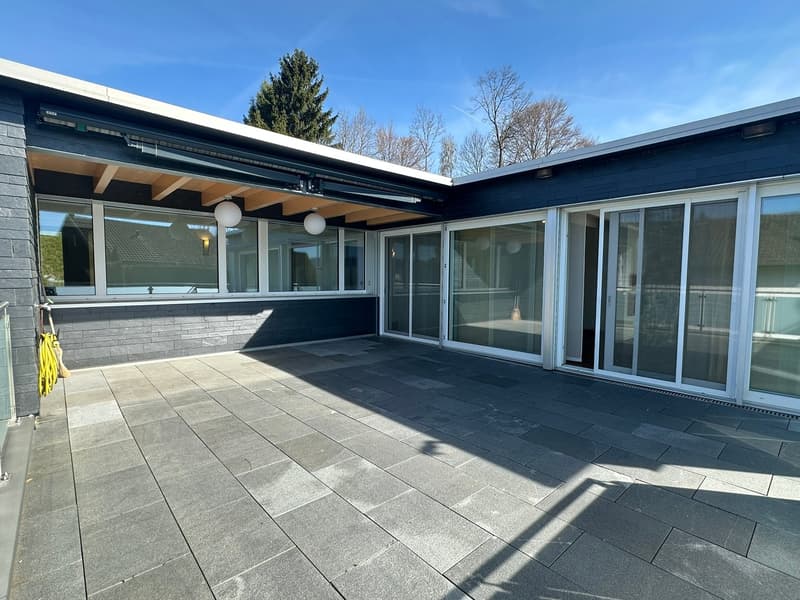 modern house, large windows, glass doors, tiled terrace, outdoor lighting