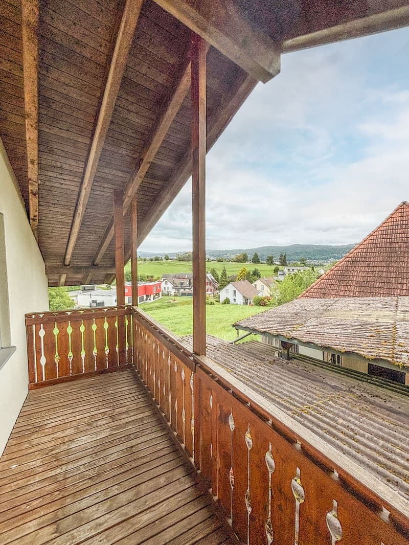 wooden floor, wooden railing, wooden ceiling, view of the countryside