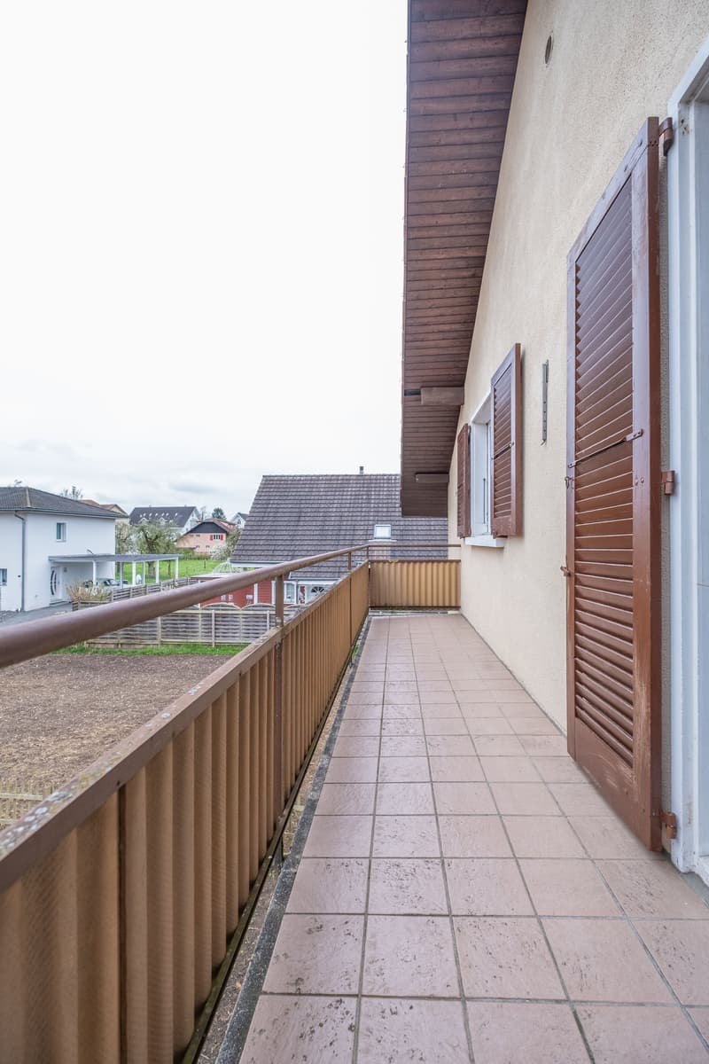 tiled floor, wooden railing, brown wooden shutters, wooden ceiling