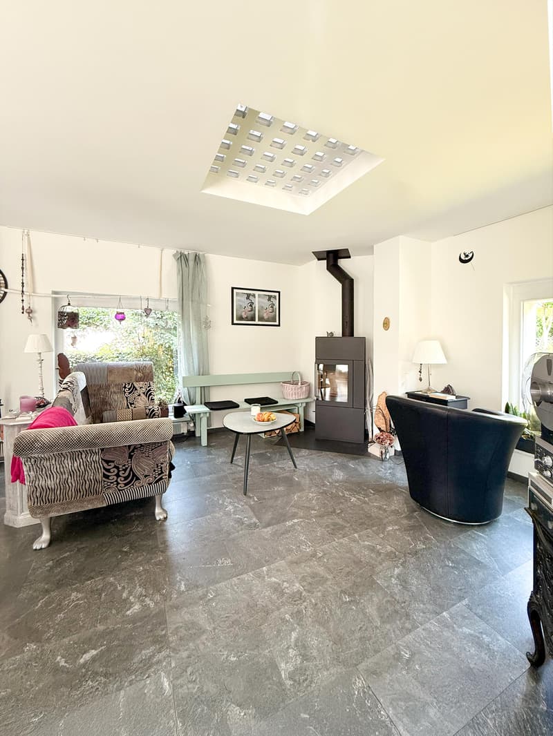Wohnzimmer mit Cheminée