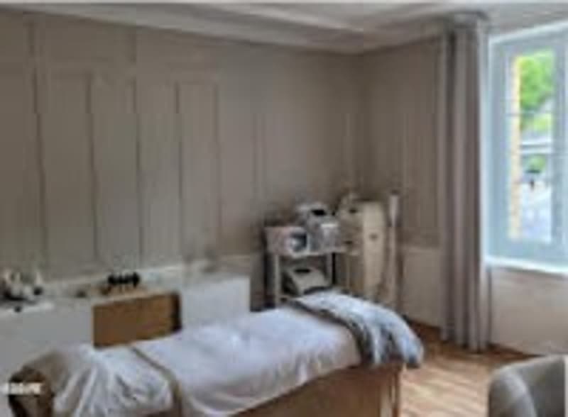 empty room, bed, medical equipment, window, wooden floor, white walls