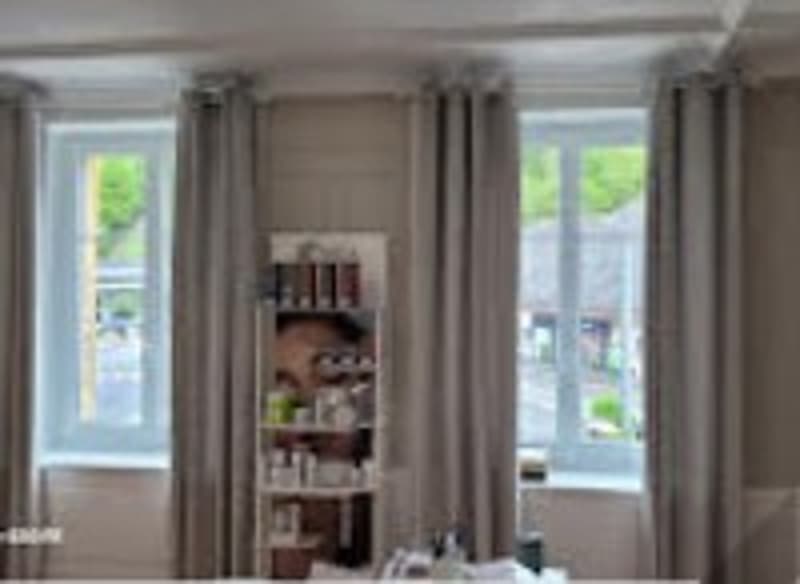 neutral colors, two windows, gray curtains, white walls, two shelves