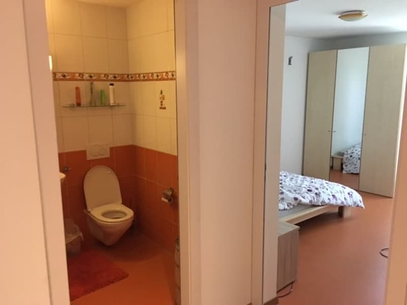 Maison mitoyenne spacieuse de 6 pièces à Neuchâtel – Vue, calme et confort familial (13)