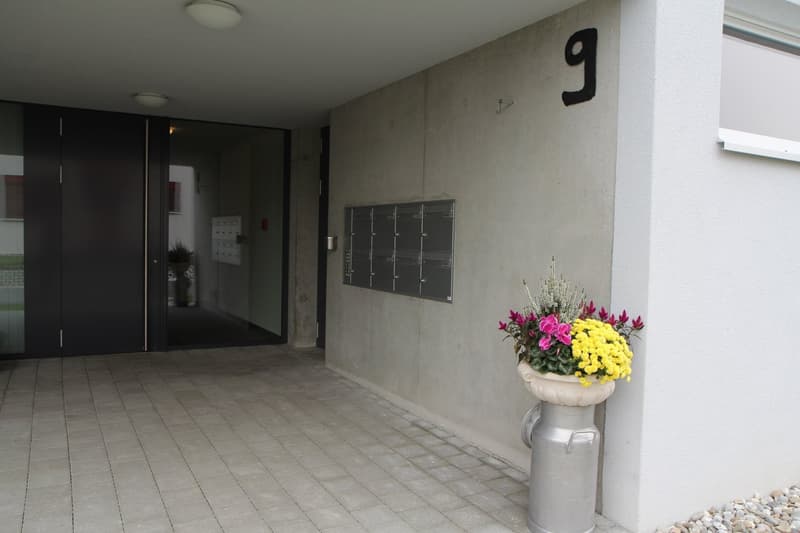 tiled floor, double doors, mail box, mailbox, flower vase