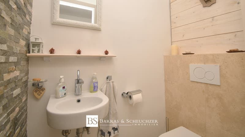 WC séparés / a white sink and toilet in a small room