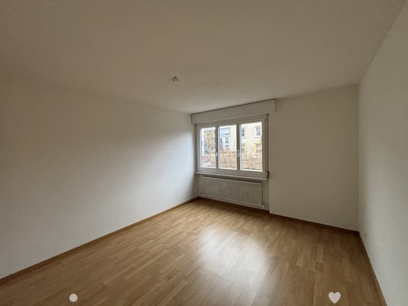empty room, white walls, wooden floor, white ceiling, window, radiator