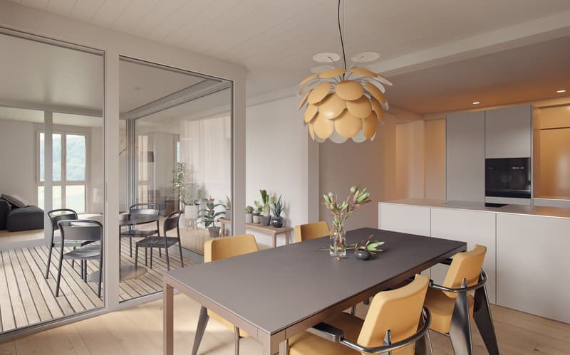 Open concept dining area with wooden floors, dining table, yellow chairs, large glass doors to balcony, pendant light, potted plants, kitchen with modern appliances, black table, vases with flowers