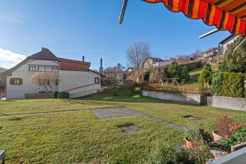 Charmant et spacieux appartement PPE de 4.5 pièces avec balcon, jardin commun et 3 places de parc (13)