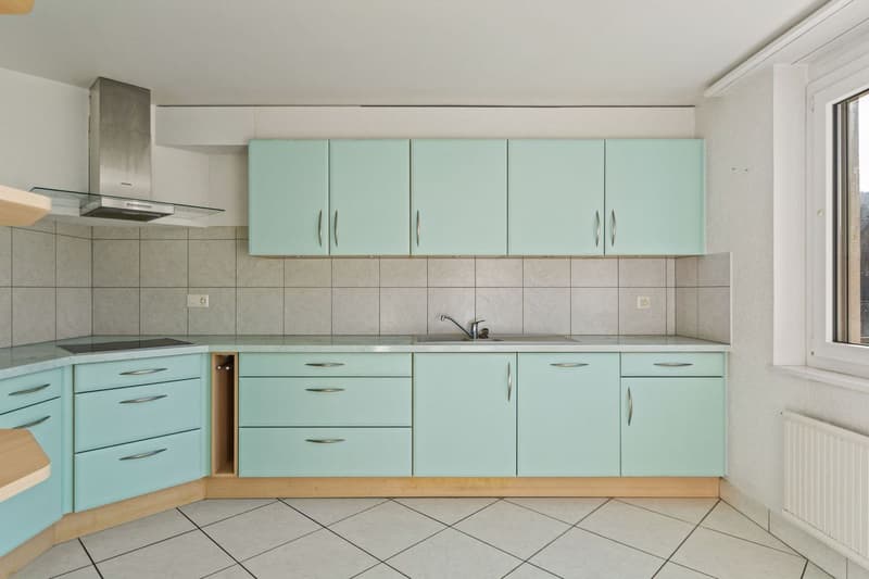 Charmant et spacieux appartement PPE de 4.5 pièces avec balcon, jardin commun et 3 places de parc (7)