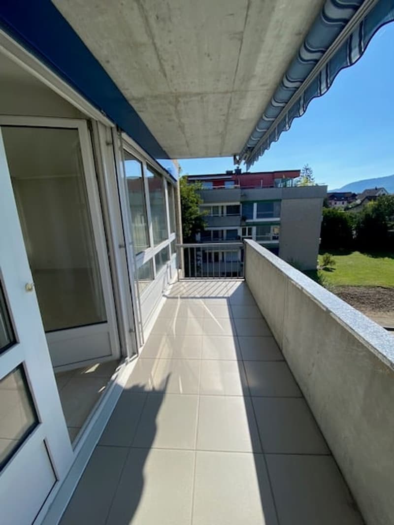 tiled floor, steel railing, metal awning