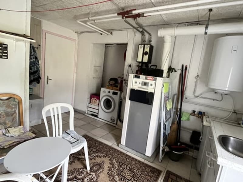 Grand bâtiment comprenant 2 logements de 5,5 pièces (22)