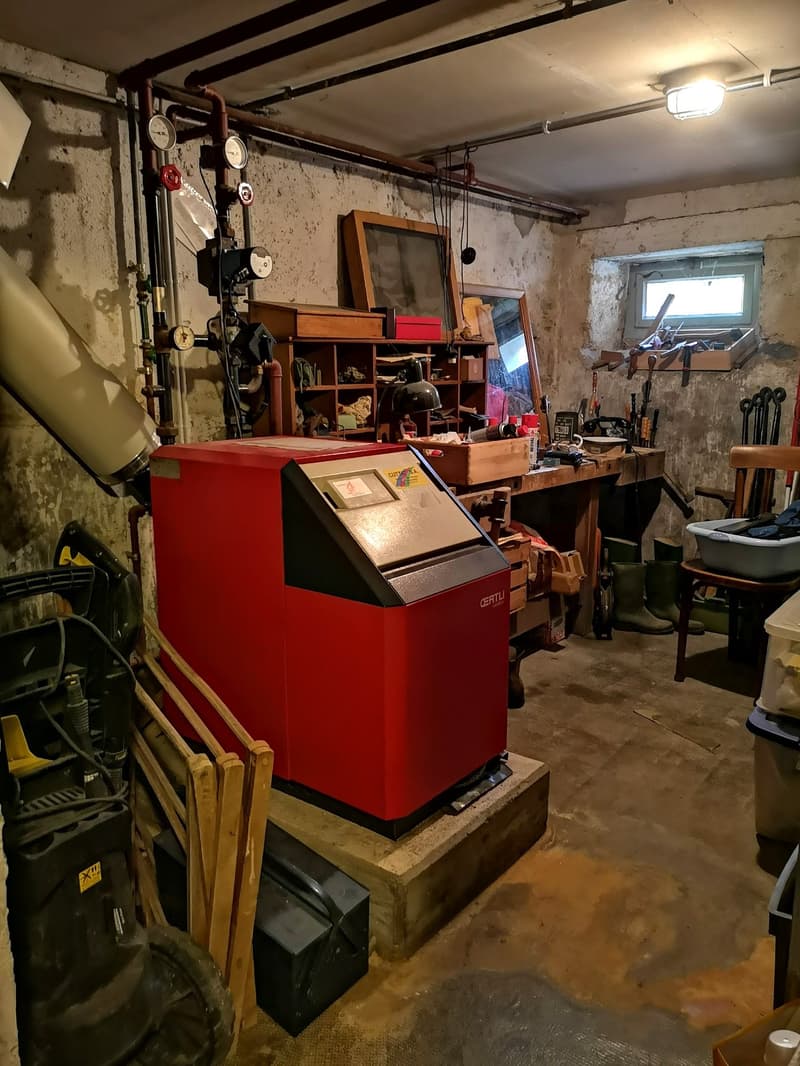 Maison multifonctionnelle avec 3 appartements, carnotzet et jardin (57)