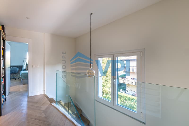 Duplex en attique magnifiquement rénové (6)