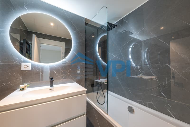 Duplex en attique magnifiquement rénové (7)