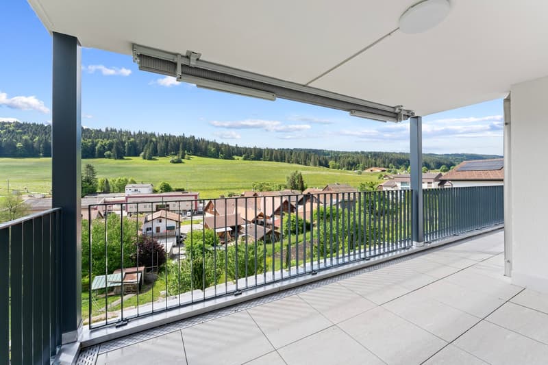 modern apartment, balcony with railing, open view of a valley and houses