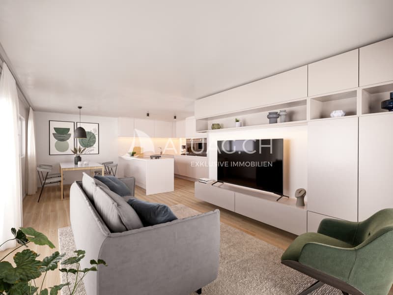 Modernes, lichtdurchflutetes Wohn- und Esszimmer mit offener Küche.