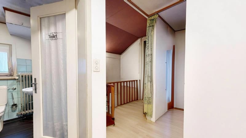 Casa a due famiglie con necessità di ristrutturazione e lotto edificabile supplementare (6)
