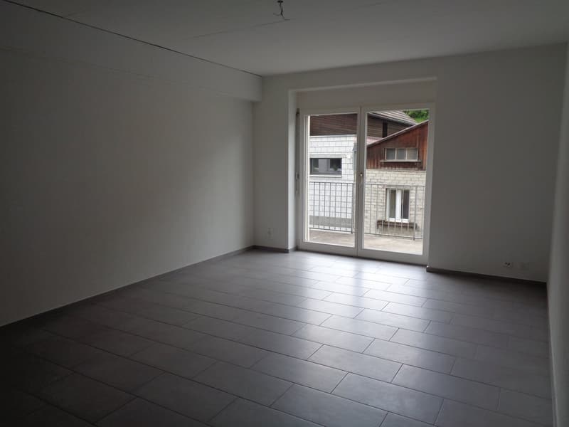 empty room, white walls, tiled floor, sliding glass door, balcony