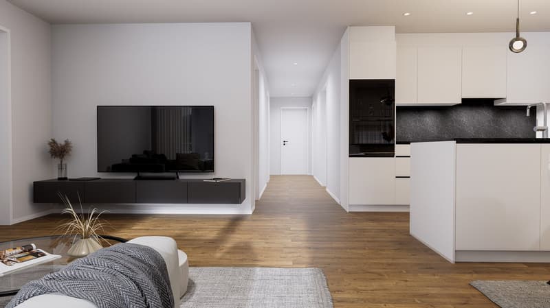 contemporary design living room with a television, glass coffee table, beige couch, wooden floors, white cabinets, modern kitchen with black marble countertops