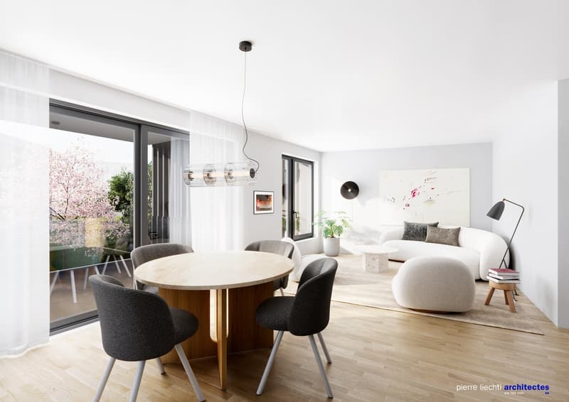 Dining area with round table, chairs, white couch, white curtains, glass doors, plants, artwork, lamp