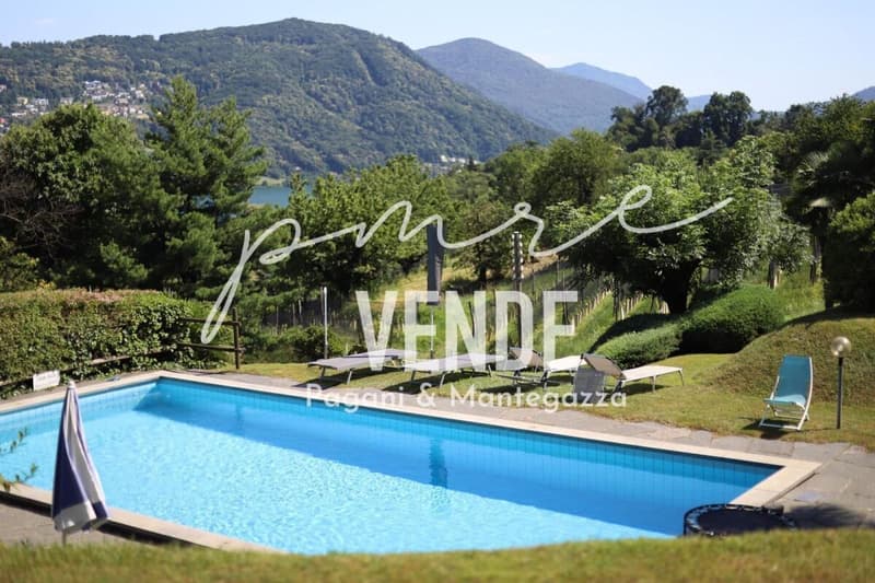 Habiter avec panorama : appartement 4.5 pièces avec vue sur le lac et piscine à Agno (14)
