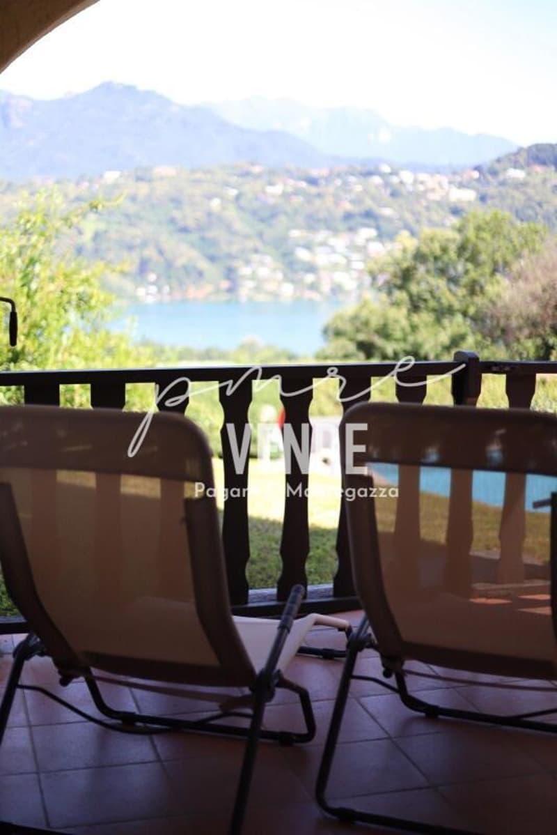 Habiter avec panorama : appartement 4.5 pièces avec vue sur le lac et piscine à Agno (4)