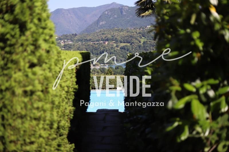 Habiter avec panorama : appartement 4.5 pièces avec vue sur le lac et piscine à Agno (19)