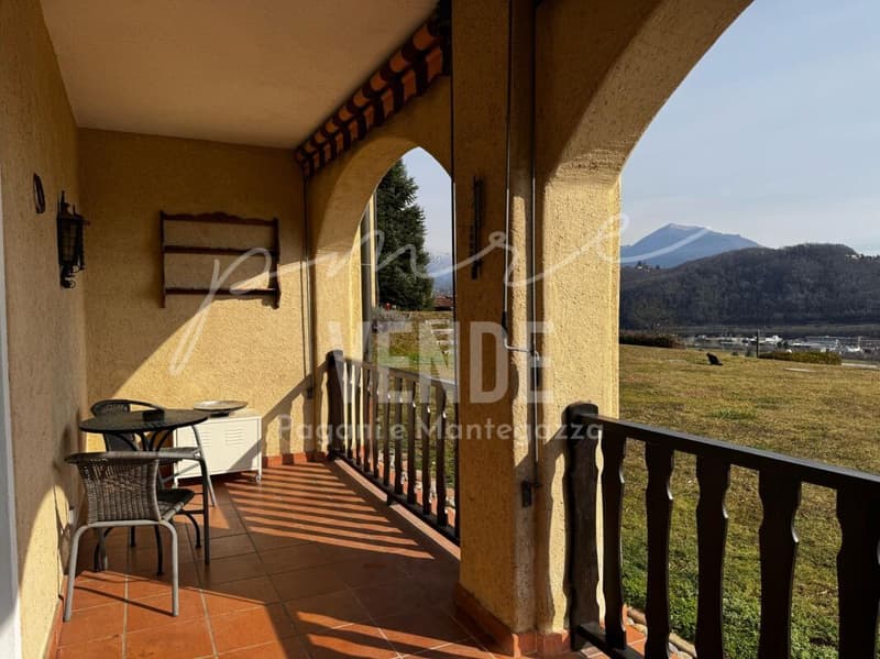 Habiter avec panorama : appartement 4.5 pièces avec vue sur le lac et piscine à Agno (2)