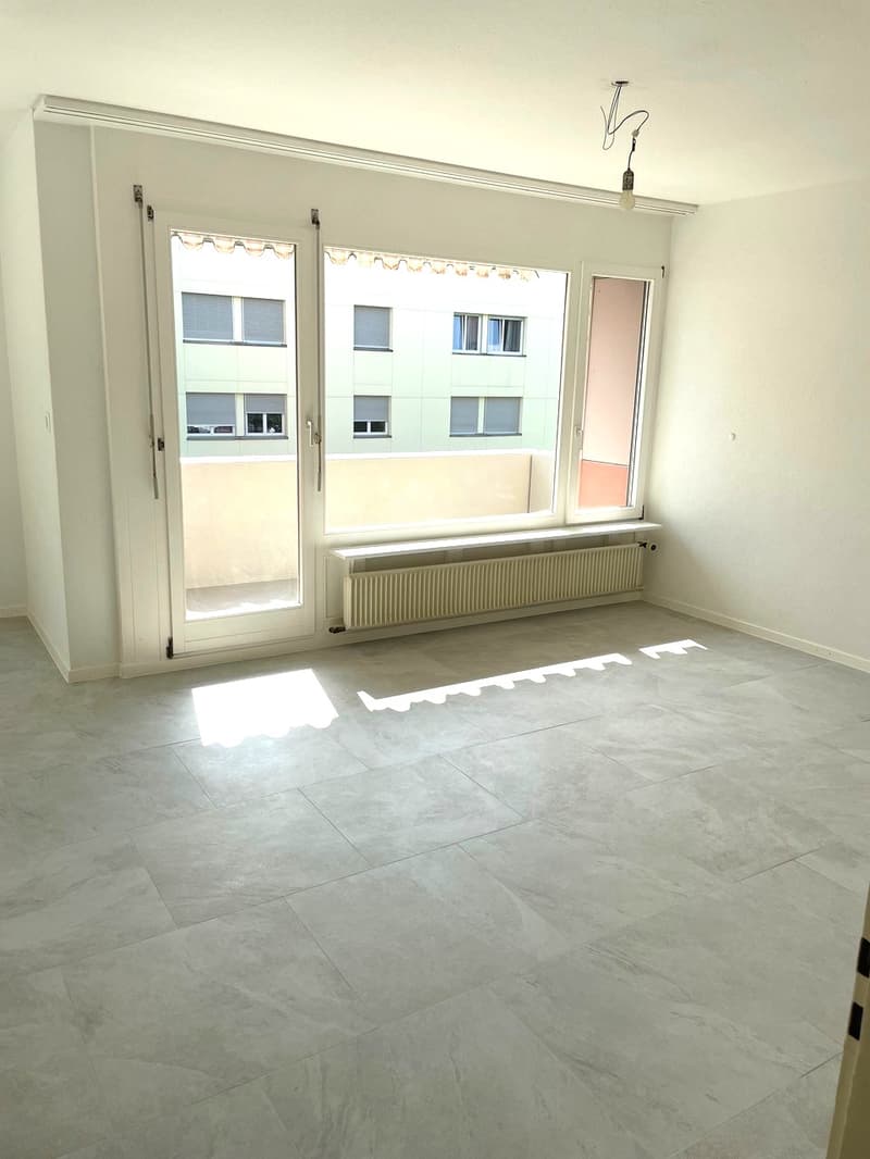 empty room, white walls, tiled floor, sliding glass doors, balcony, radiator, ceiling lamp