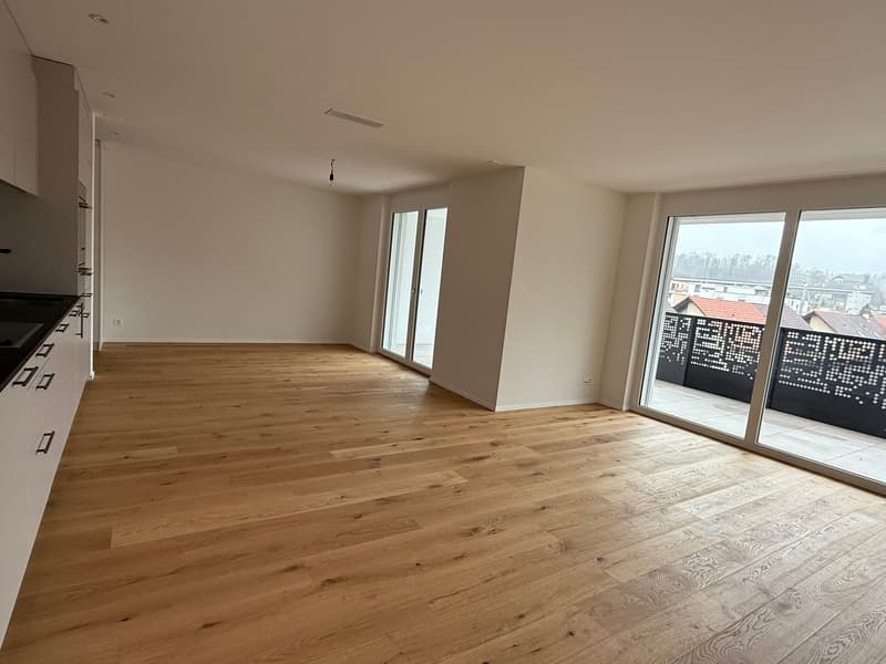 empty room, wooden floor, white walls, sliding glass doors, balcony