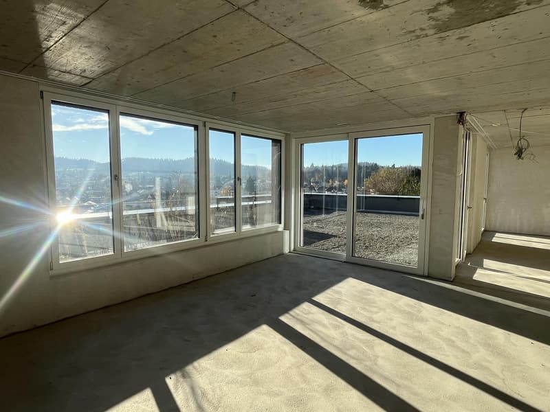 Attikawohnung mit grosser Terrasse inkl. zwei Tiefgaragenparkplätzen an ruhiger Lage. (12)