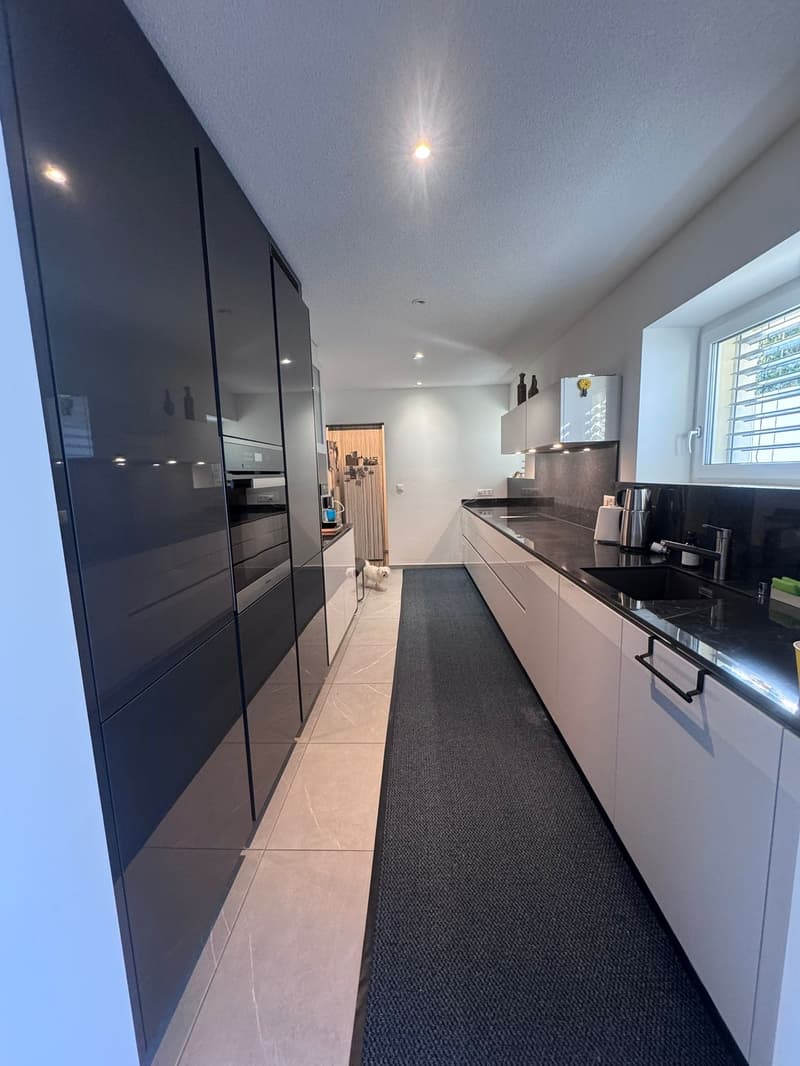 Exklusives Einfamilienhaus mit Einliegerwohnung an ruhiger Hanglange. (11)