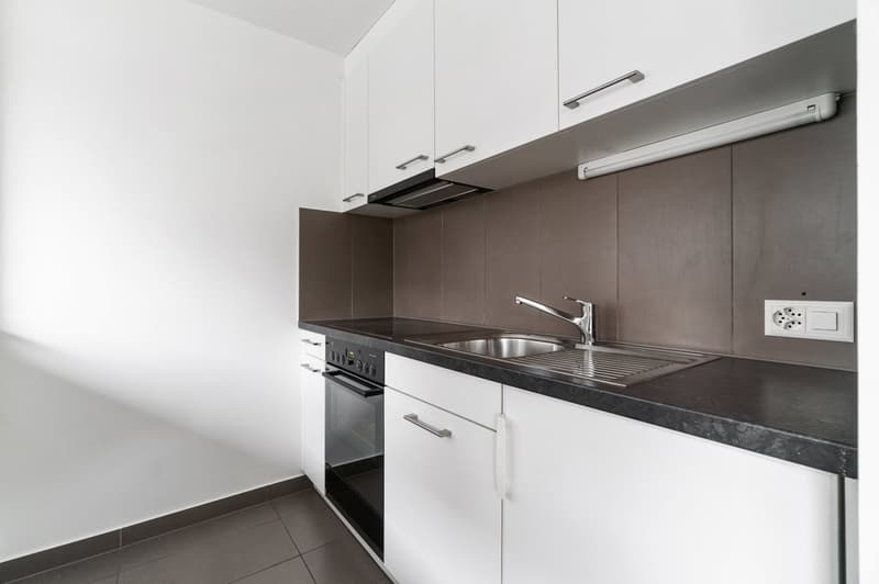 Joli appartement à proximité des commerces et des transports publics (2)