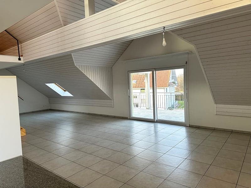 empty room, tiled floor, sliding glass doors, wooden ceiling, skylights