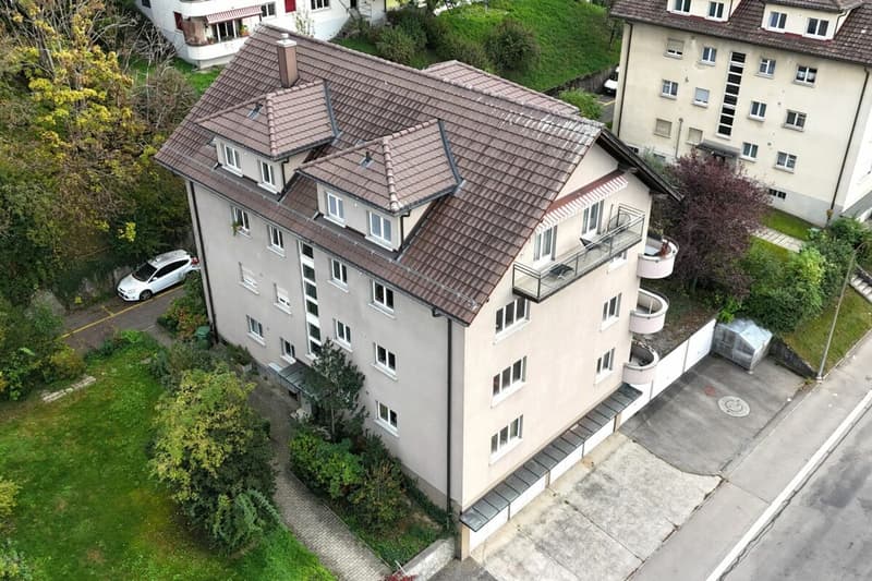 Mehrfamilienhaus mit 8 Wohnungen und 7 Garagen (2)