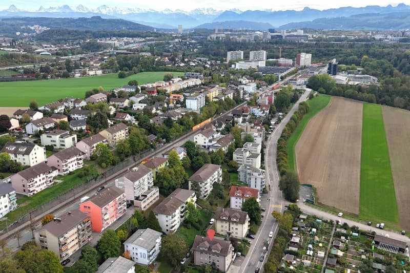 Mehrfamilienhaus mit 8 Wohnungen und 7 Garagen (6)